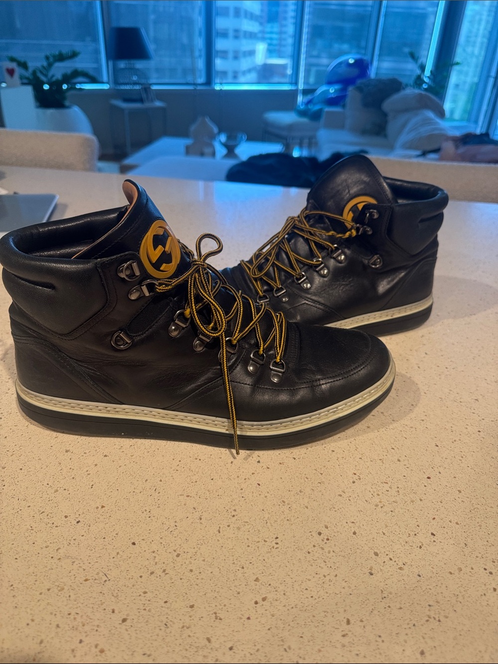 Gucci Black Leather High-Top Boots with Yellow Logo and Laces